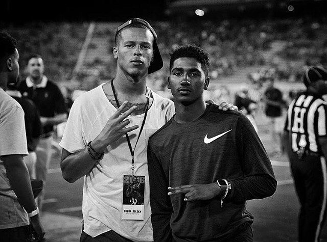 Bubba Bolden + Alex Perry — Game Sideline (Bolden Credential Visible)
