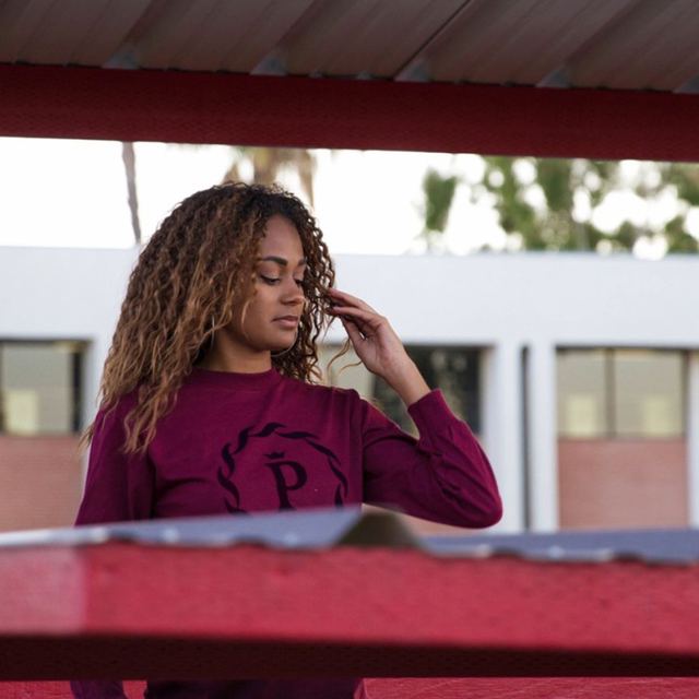 PRCZN (Precision) Suggested Apparel — Red Crimson Sweater Female Model in LA