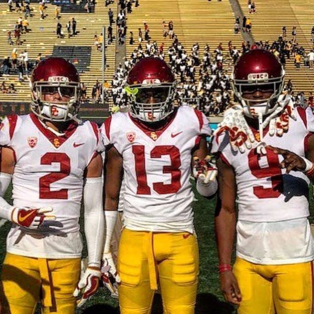 Bubba Bolden #2 + Randal Grimes #9 — USC Game (3-Athlete Sideline)