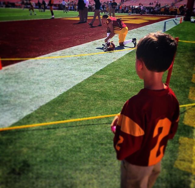Bubba Bolden #2 USC — Young Fan Wearing His #2 Jersey