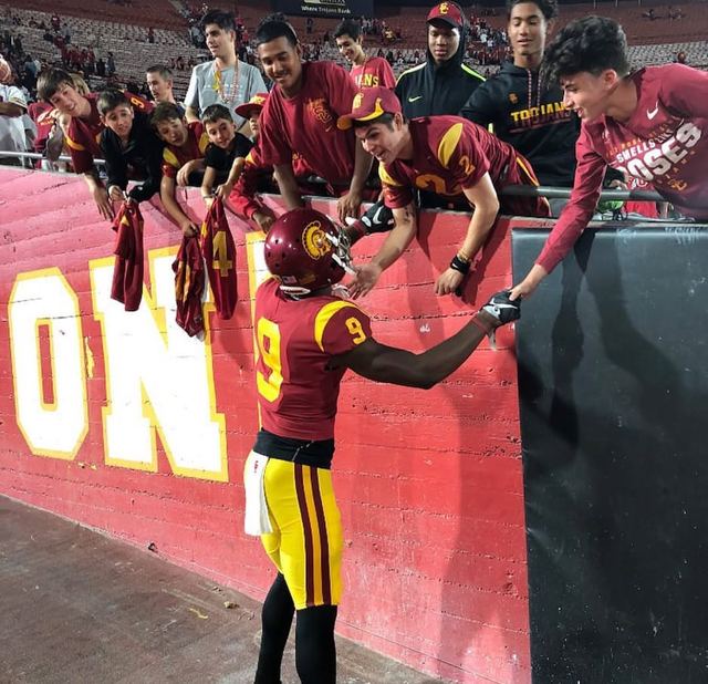Randal Grimes #9 USC — High-Fiving Fans at Stadium